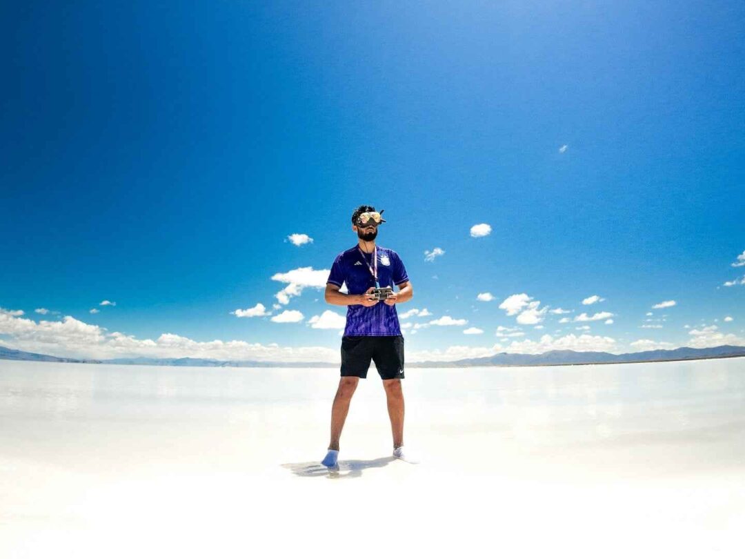 Man wearing AR VR goggles on the beach